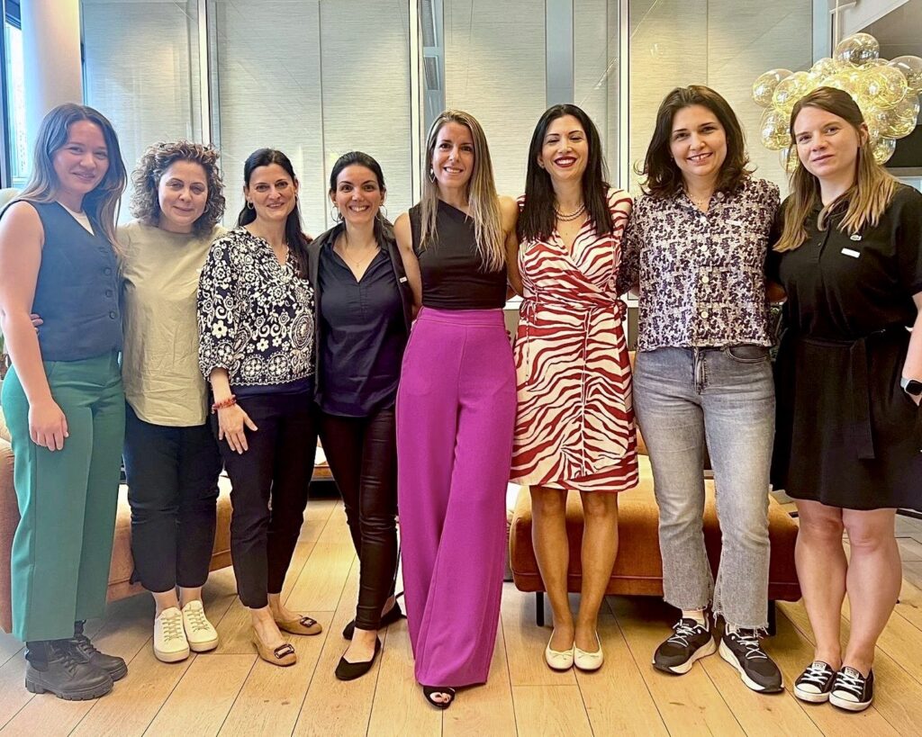 Alice Ekonomou leading the Own the Room workshop with GLOW, guiding participants through voice, breath, and presence techniques.